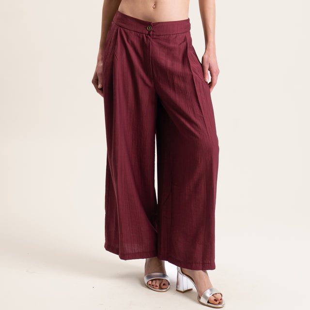 Tensione in-Pantalone viscosa goffrato - vino