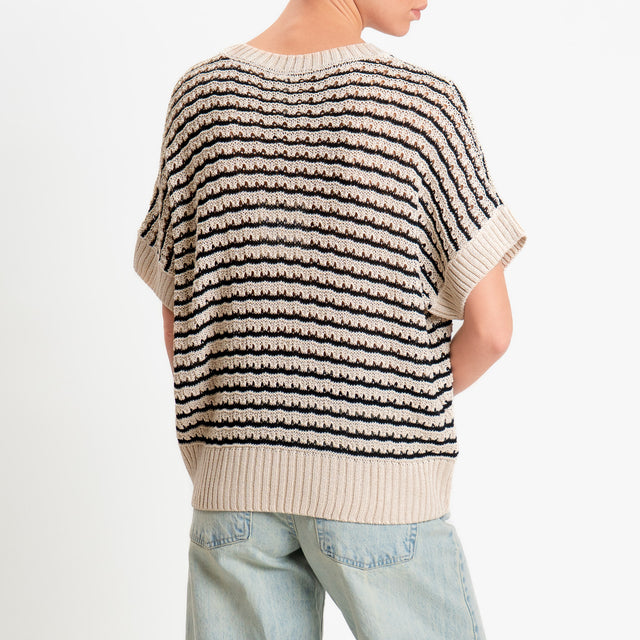 Tensione in-Maglia traforata a righe - burro/nero