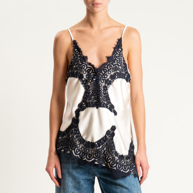 Tensione in- Top asimmetrico satin con pizzo - avorio/nero
