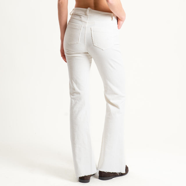 Tensione in-Pantalone bootcut sfrangiato in velluto - panna