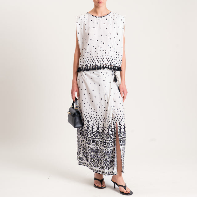 Tensione in-Blusa smanicata fantasia con nappine - burro/nero