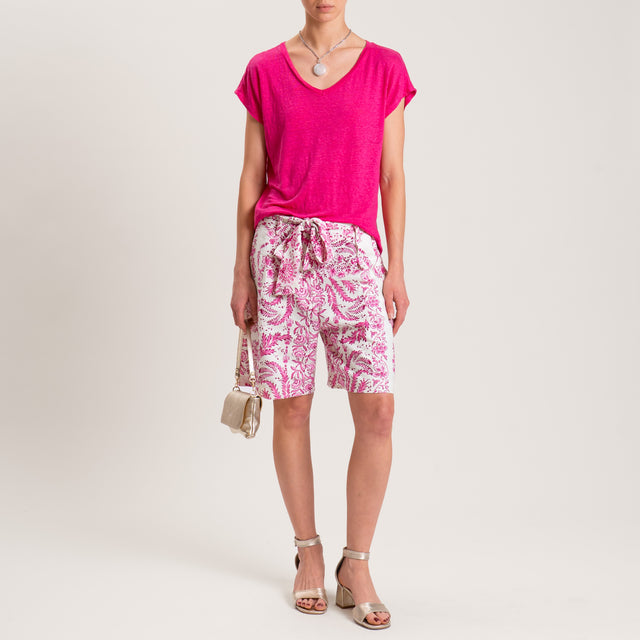 Pantalones cortos de lino con estampado floral en color leche/fucsia