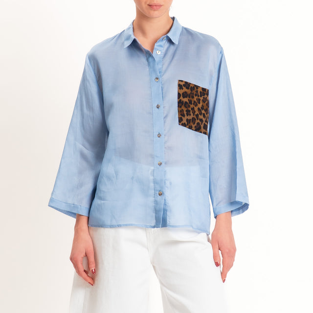 Tensione in-Camicia mussola taschino animalier - celeste