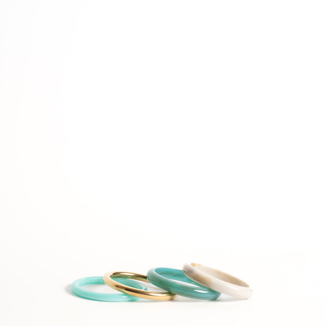 W by Whitemood-Set 4 bracciali rigidi - acqua/gold