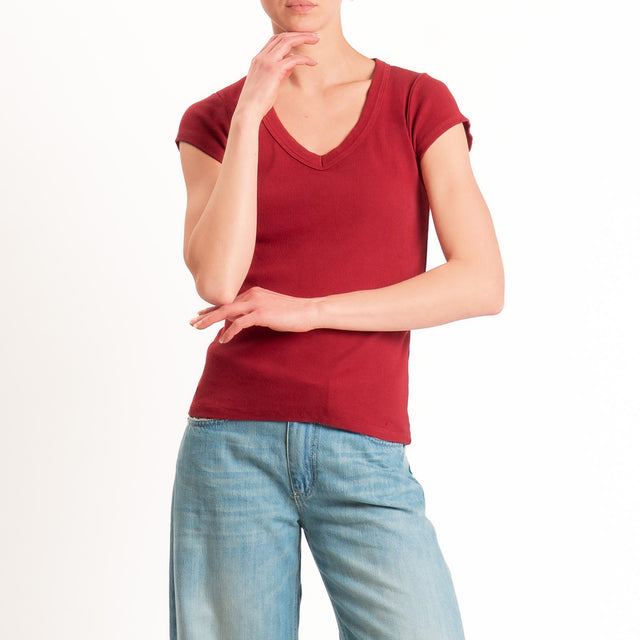 Tensione in-T-shirt scollo v a costine - india