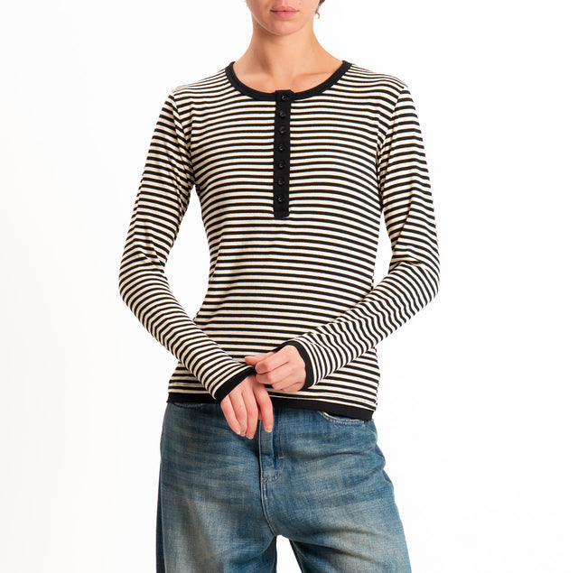 Tensione in-Maglia serafino righe in jersey - burro/nero