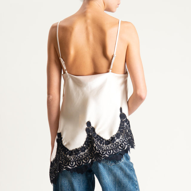 Tensione in- Top asimmetrico satin con pizzo - avorio/nero