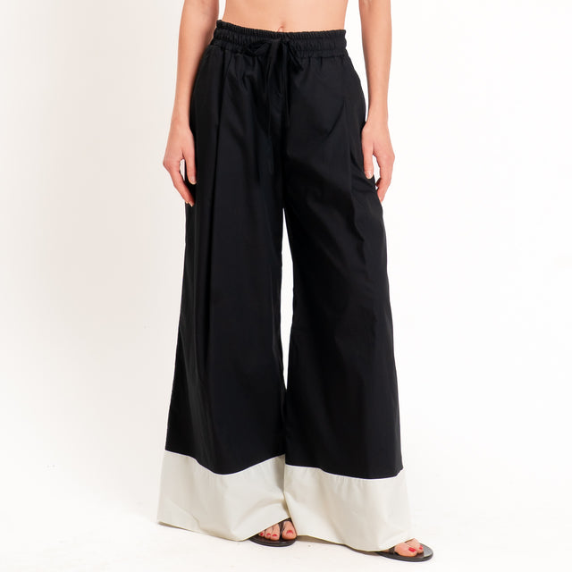 Tensione in-Pantalone popeline bicolore - nero/burro
