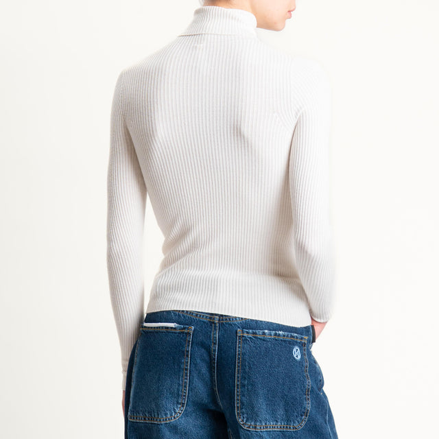 Tensione in-Maglia collo alto a costine - crema
