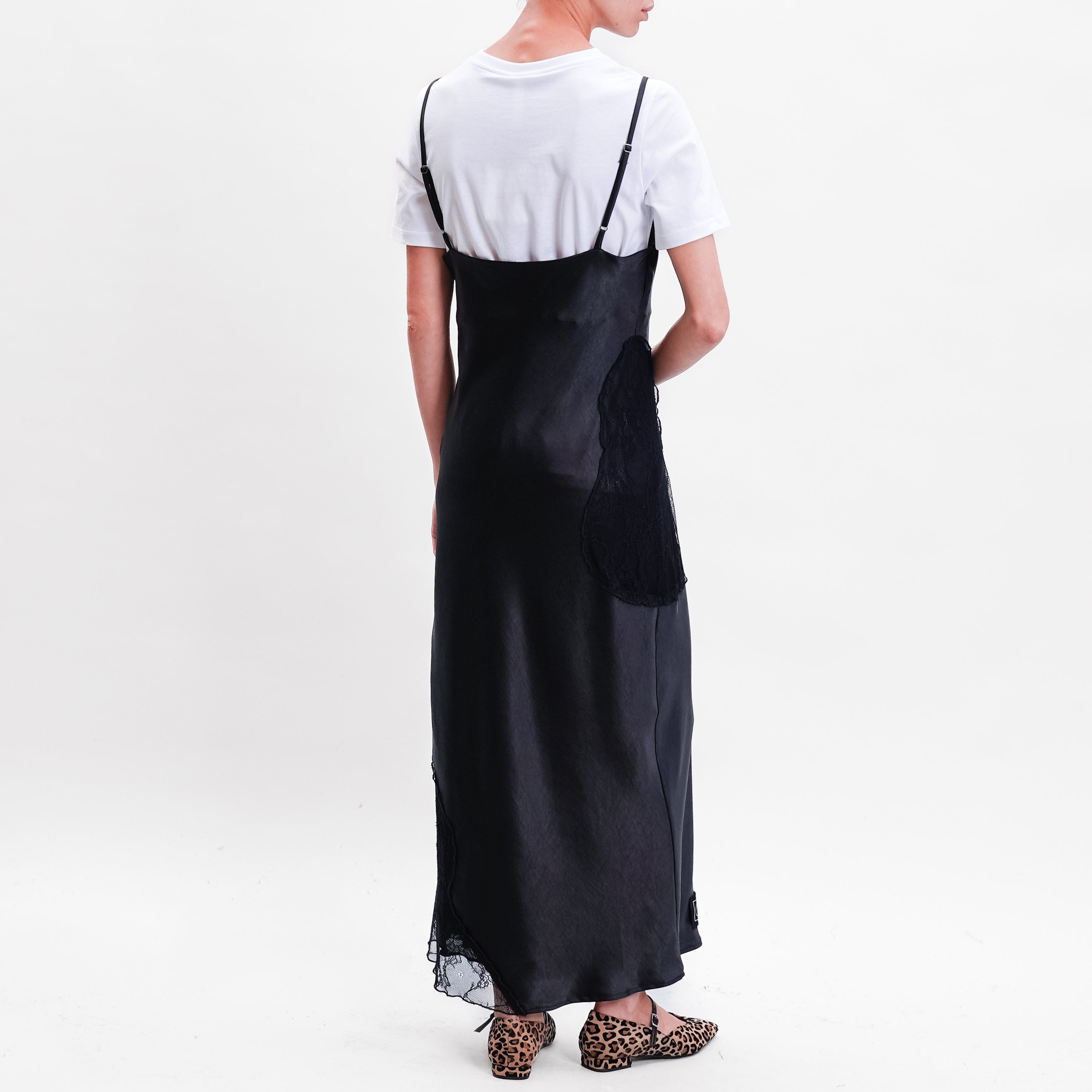 Black strap dress with white t shirt 2025