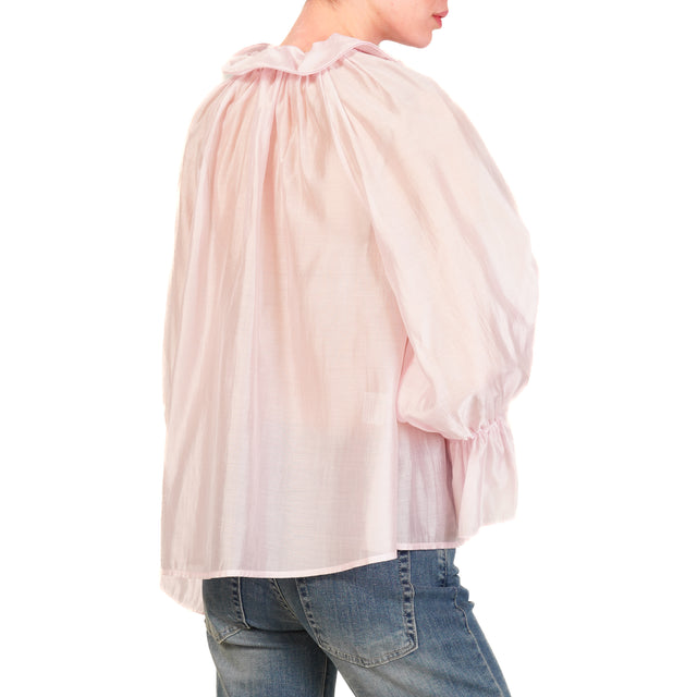 Blusa de muselina con volantes en color rosa