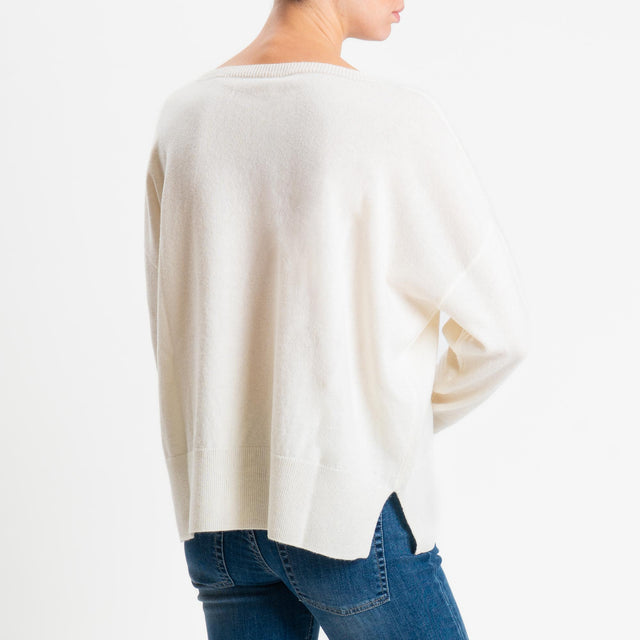 Tensione in-Maglia 100% LANA riga centrale spacchi laterali - panna